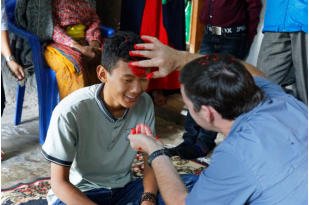 Giving the kids Tikas for Dashain